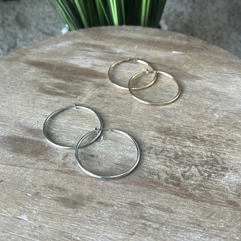 Silver and gold set of hoop earrings. Never worn, or maybe worn once.